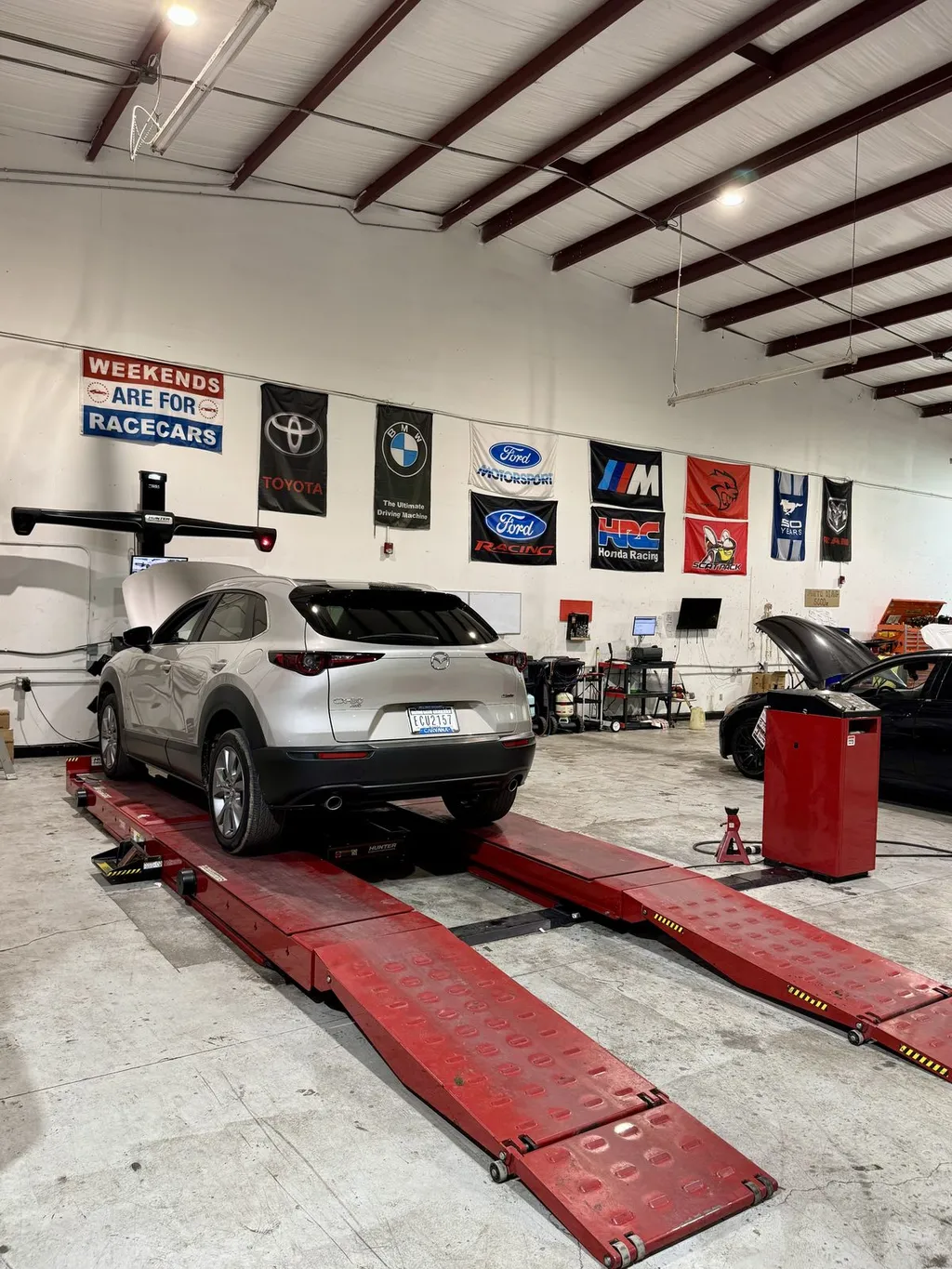 Mazda CX-30 on the alignment rack at 239 Mechanics in Cape Coral