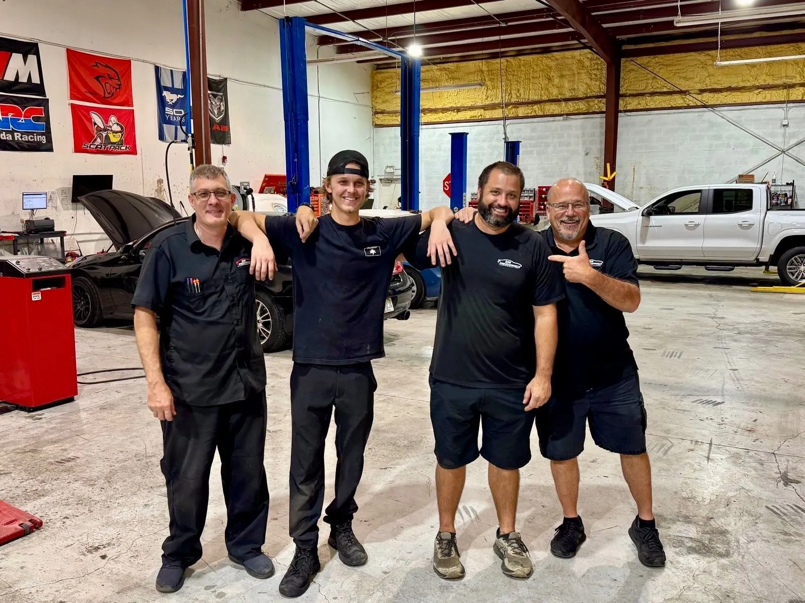 The 239 Mechanics team together in the shop in Cape Coral